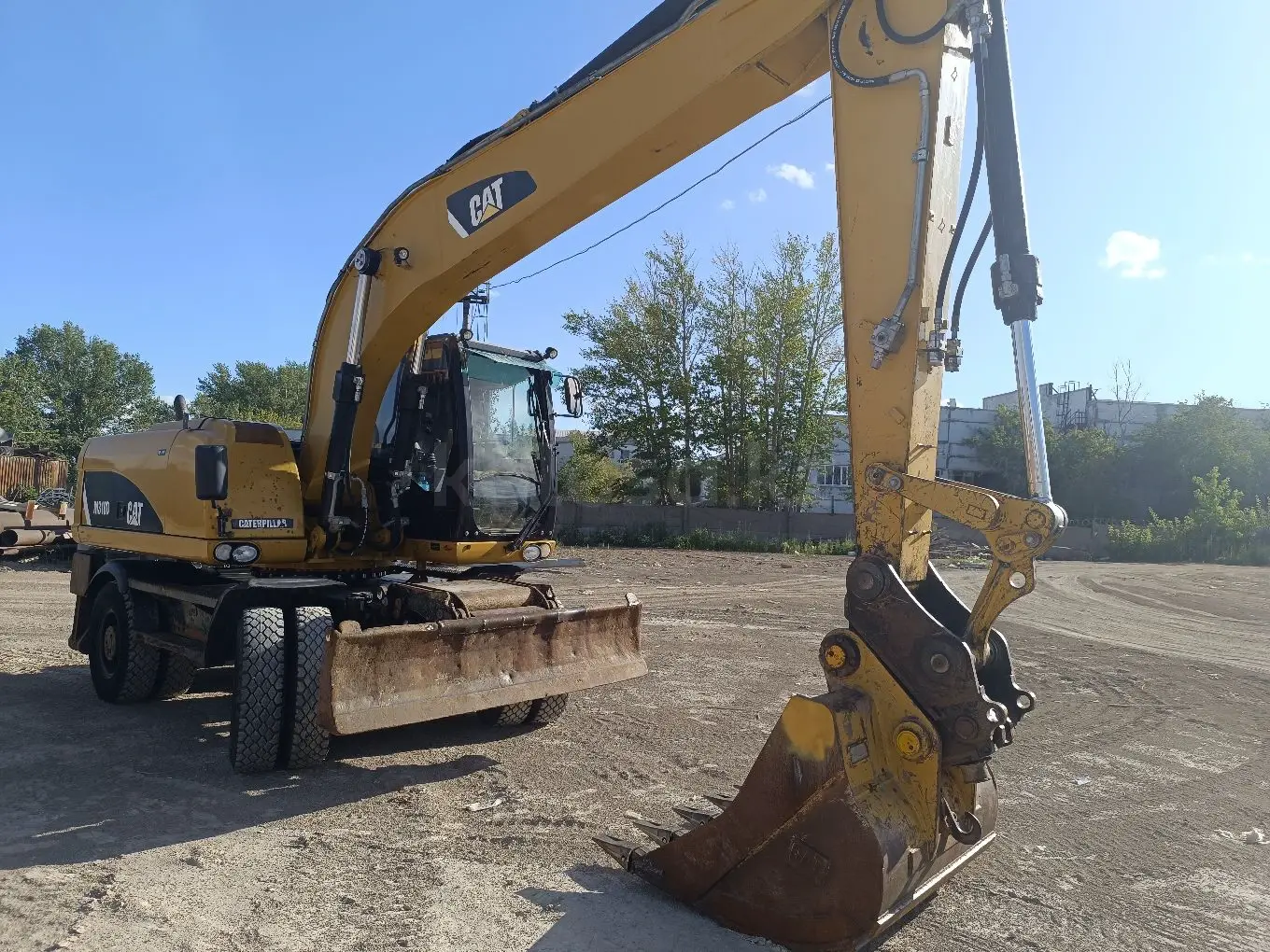 Услуги колёсного экскаватора - фото 2