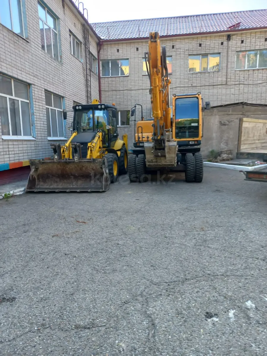 Колесные экскаваторы, экскаватор погрузчик 3/1, фронтальные погрузчики - фото 11
