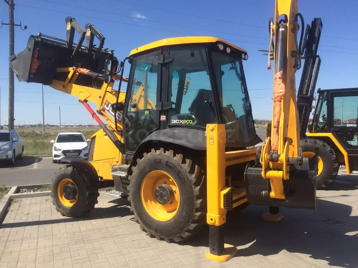 Экскаватор-погрузчик - фото 2